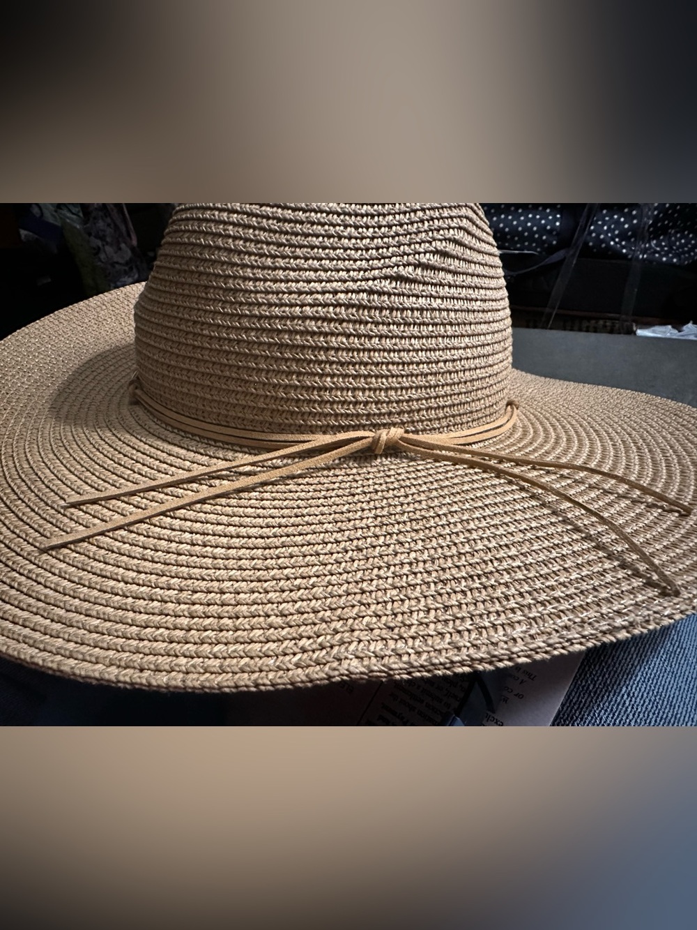 This is a Magid Straw Tie Crown Floppy Hat in tan